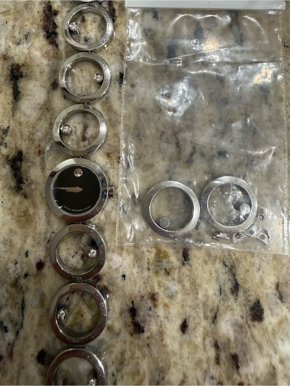 Ladies Movado Ono Elegant Stainless Steel Watch & 6 Diamond Bracelet.